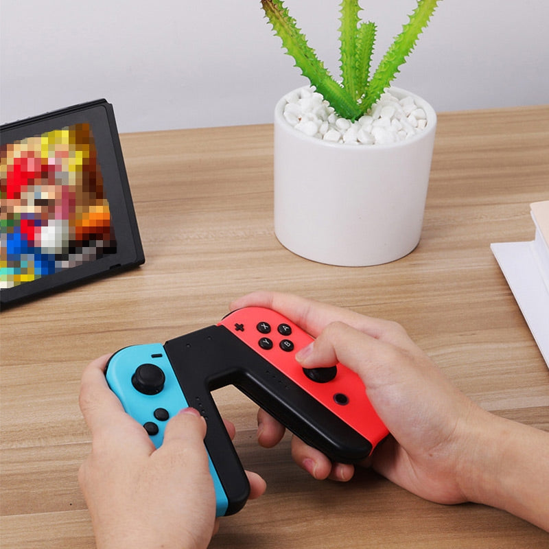 Empuñadura y cargador de JoyCon Nintendo Switch