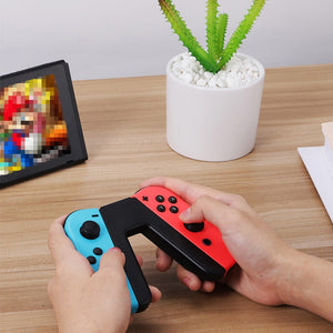 Empuñadura y cargador de JoyCon Nintendo Switch